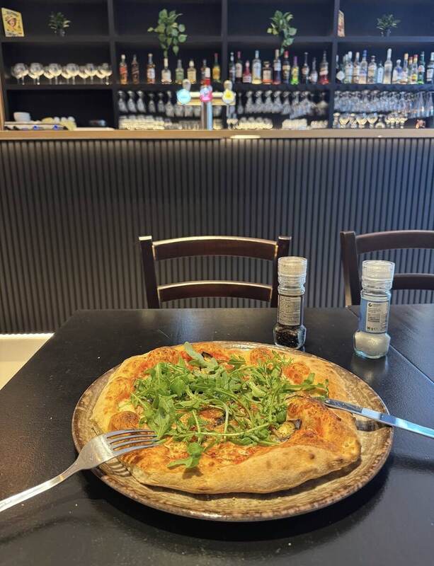 Pizza served at Hop & Go